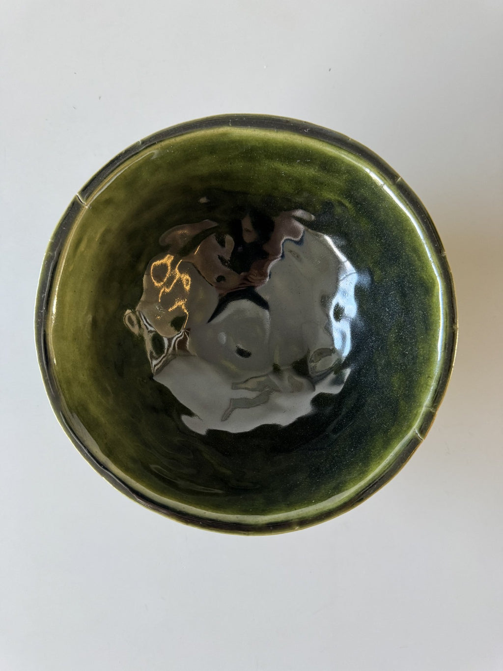 Grøn skål med spiralmønster